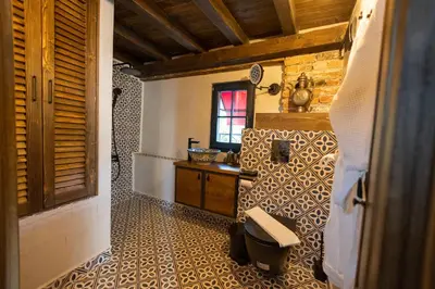 a bathroom with a sink and a toilet in a room at NOMAD STUDIOS, Kapana in Plovdiv