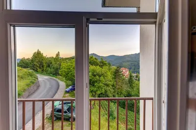 a view from a window of a road at ИНвела in Smolyan