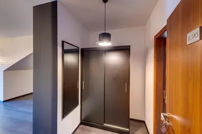 a hallway with two elevators in a building at Black Box Studio in Smolyan