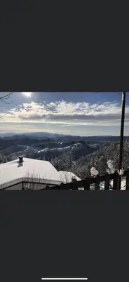 a view of a snow covered mountain with the sky at Александрова вила 2 in Zlatograd