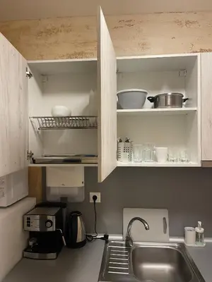 a kitchen with a sink and a counter top at Colonel apartment 936 in Sofia