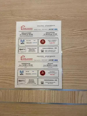 a piece of paper sitting on top of a wooden wall at Colonel apartment 938 in Sofia