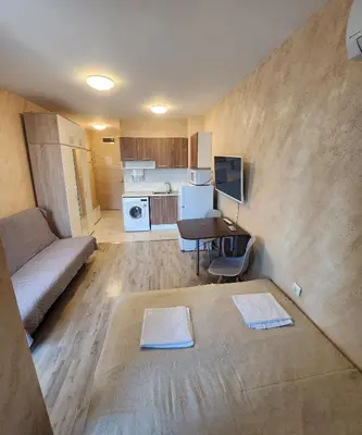 a living room with a couch and a table at Colonel apartment 944 in Sofia