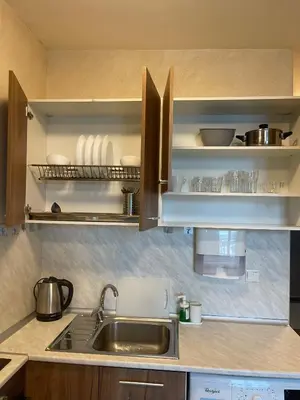 a kitchen with a sink and a counter top at Colonel apartment 945 in Sofia