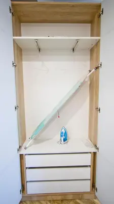 a shelf in a closet with white drawers at Colonel apartment Bijou in Sofia