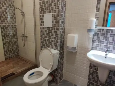 a bathroom with a toilet and a sink at Colonel apartment 957 in Sofia