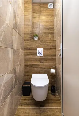 a bathroom with a toilet in the corner at Bright Modern 2BD Apartment with Panoramic View by Flat Mаnager in Plovdiv