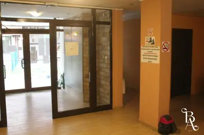 an entrance to a building with a glass door at Bansko Apart in Bansko