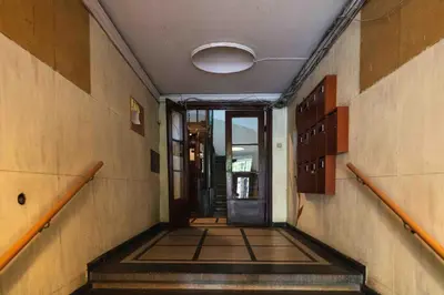 an empty hallway with a door in a building at Heart of the City Center Lux Apartment with View in Sofia