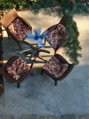 a group of chairs with christmas presents on them at Стаи за гости - Цветето на Ангела in Bankya