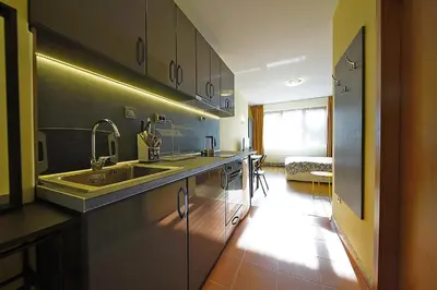 a kitchen with a sink and a counter top at Borovets Hills Apartments - Studio 33 in Borovets