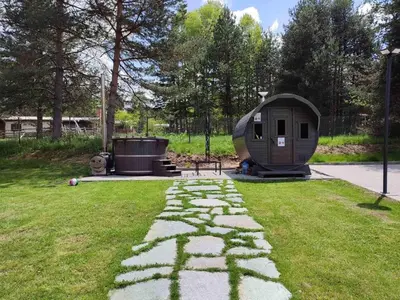 a small dome tent sitting on a grass field at Вила АМРИТА in Tsigov Chark