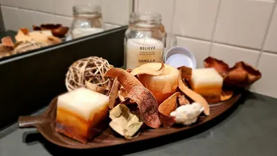 a plate of cheese and other foods on a counter at Euphoria Club and Resort Rental in Bŭrduche