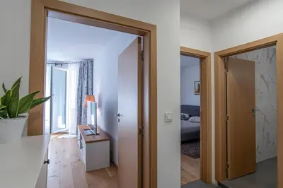 a hallway with a door leading to a bedroom at 