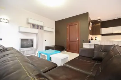 a living room with a couch and a tv at Trendy & Deluxe Apartment by Flat Mаnager in Plovdiv