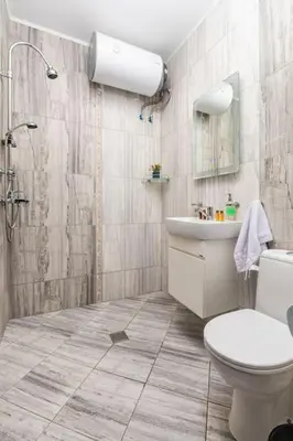a bathroom with a toilet and a sink and a shower at 'Little Little' House in the town CENTER & PARKING in Plovdiv
