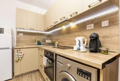 a kitchen with a sink and a counter top at 'Little Little' House in the town CENTER & PARKING in Plovdiv