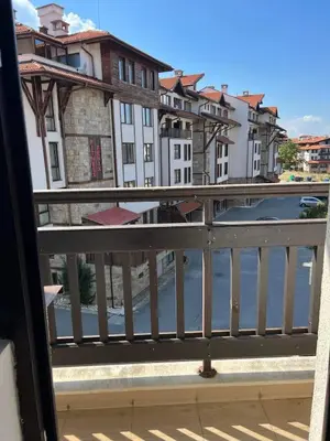 a view of a city from a balcony at Jordan Apartment’s Bansko in Bansko
