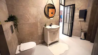 a bathroom with a sink and a toilet and a mirror at Modern and Spacious 3-Bedroom Entire House in Sofia