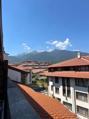 a view of a city with mountains in the background at Bansko Royal Towers 253 in Bansko