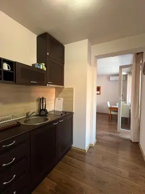 a kitchen with a sink and a counter top at Bansko Royal Towers 253 in Bansko