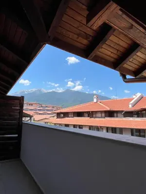 a view of the mountains from the balcony of a building at Bansko Royal Towers 253 in Bansko