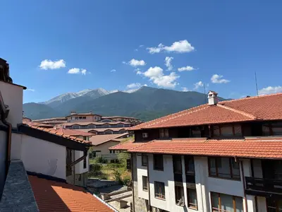 a view of a town with mountains in the background at Bansko Royal Towers 253 in Bansko