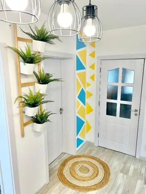 a room with potted plants on the wall at Bulgarane House in Govedartsi