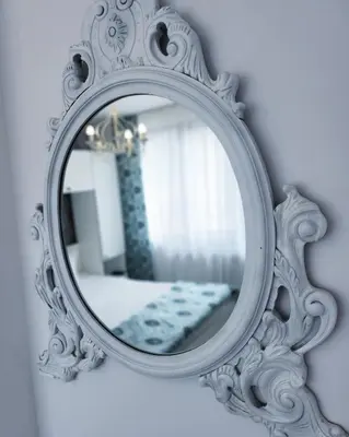 a white mirror on a wall with a bedroom at Bulgarane House in Govedartsi
