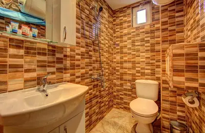 a bathroom with a toilet and a sink and a shower at 1BD Nest in the heart of a traditional Sofia by Flat Mаnager in Sofia