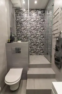 a bathroom with a toilet and a walk in shower at Unique Central 1 Bedroom Flat in Sofia