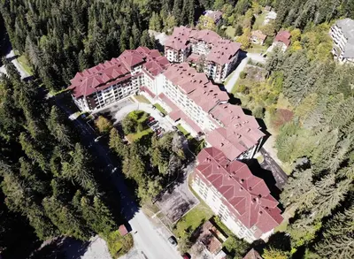 an overhead view of a large house with red roof at Arboro Borovets Gardens E68 in Borovets