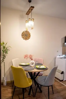 a dining room with a table and chairs at Studio Stankovic Royal Towers 326 in Bansko