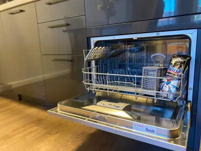 an open oven with a dish rack in it at Studio Nr 6 in Bansko