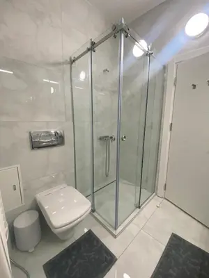 a bathroom with a shower and a toilet at Studio Nr 6 in Bansko
