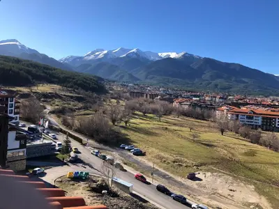a view of a city with mountains in the background at Pirin and Bansko view Studio in Bansko