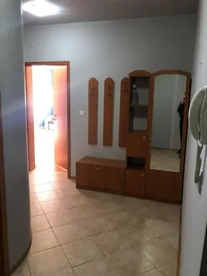 a bathroom with a mirror and a dressing room at One Bedroom Flat With Garden and Barbeque in Bansko
