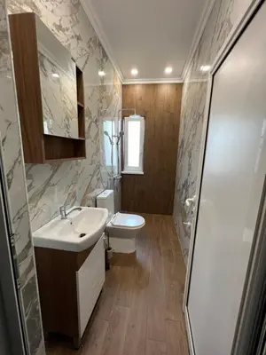 a bathroom with a sink and a toilet at Elegant and cozy room ARAKS in Kostinbrod