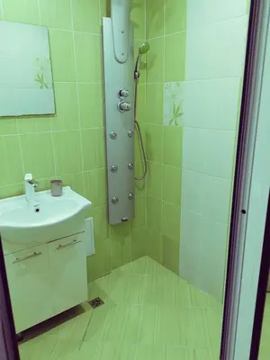 a bathroom with a shower and a sink at Alexander Apartments Kyustendil in Kyustendil