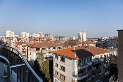 a view of a city with tall buildings at Tony's Sunny Rooftop Studio by Flat Mаnager in Sofia