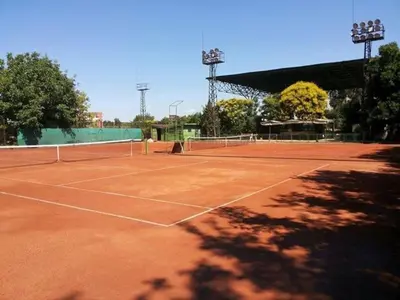 a tennis court with a tennis racket on it at Luxury apartment 2 Free Underground Secure Parking in Pazardzhik