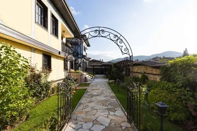 an entrance to a house with an iron gate at Armaco Residence in Koprivshtitsa