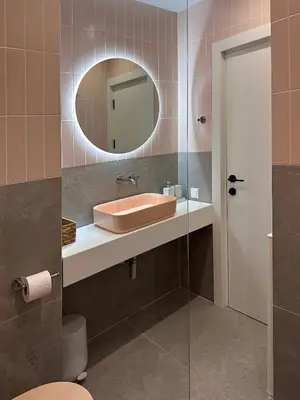 a bathroom with a sink and a mirror at Apartment BonBon next to Gondola in Bansko