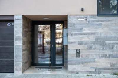 a entrance to a building with a glass door at Design Loft in the City Center in Sofia