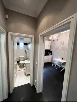 a bathroom with a toilet and a sink and a bathroom at Doctors Garden Appartment in Sofia