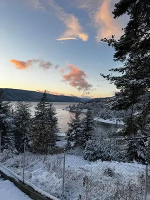 a view of a lake with snow on the ground at Villa Siesta Dospat in Dospat
