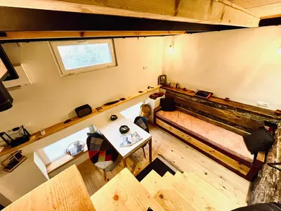 an overhead view of a room with a couch and a table at Balloon Boutique House, City Centre in Plovdiv