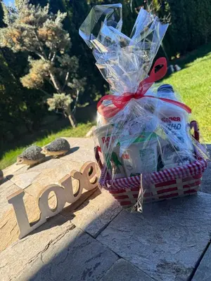 a picnic basket sitting on top of a sign at Boutique Holiday Pirin Golf in Razlog