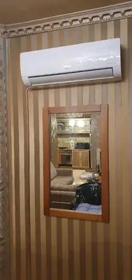 a mirror on a wall in a room at Harriet Hill Designer Bansko in Bansko