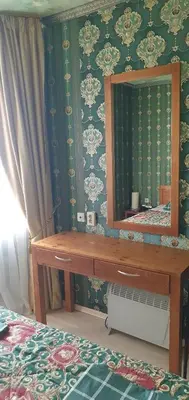 a bedroom with a table and a mirror and a bed at Harriet Hill Designer Bansko in Bansko